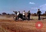 Image of 1st Cavalry Division artillerymen firing 105mm Howitzer Plei Me Vietnam, 1965, second 11 stock footage video 65675067579
