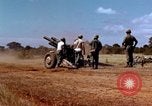 Image of 1st Cavalry Division artillerymen firing 105mm Howitzer Plei Me Vietnam, 1965, second 12 stock footage video 65675067579