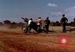 Image of 1st Cavalry Division artillerymen firing 105mm Howitzer Plei Me Vietnam, 1965, second 13 stock footage video 65675067579