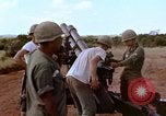 Image of 1st Cavalry Division artillerymen firing 105mm Howitzer Plei Me Vietnam, 1965, second 14 stock footage video 65675067579