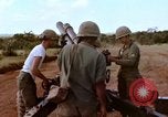 Image of 1st Cavalry Division artillerymen firing 105mm Howitzer Plei Me Vietnam, 1965, second 15 stock footage video 65675067579