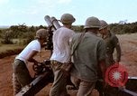 Image of 1st Cavalry Division artillerymen firing 105mm Howitzer Plei Me Vietnam, 1965, second 16 stock footage video 65675067579