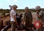 Image of 1st Cavalry Division artillerymen firing 105mm Howitzer Plei Me Vietnam, 1965, second 20 stock footage video 65675067579