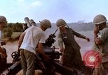 Image of 1st Cavalry Division artillerymen firing 105mm Howitzer Plei Me Vietnam, 1965, second 22 stock footage video 65675067579