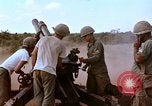 Image of 1st Cavalry Division artillerymen firing 105mm Howitzer Plei Me Vietnam, 1965, second 24 stock footage video 65675067579