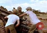 Image of 1st Cavalry Division artillerymen firing 105mm Howitzer Plei Me Vietnam, 1965, second 29 stock footage video 65675067579