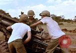 Image of 1st Cavalry Division artillerymen firing 105mm Howitzer Plei Me Vietnam, 1965, second 30 stock footage video 65675067579