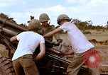 Image of 1st Cavalry Division artillerymen firing 105mm Howitzer Plei Me Vietnam, 1965, second 31 stock footage video 65675067579