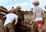 Image of 1st Cavalry Division artillerymen firing 105mm Howitzer Plei Me Vietnam, 1965, second 33 stock footage video 65675067579