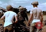 Image of 1st Cavalry Division artillerymen firing 105mm Howitzer Plei Me Vietnam, 1965, second 36 stock footage video 65675067579