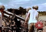 Image of 1st Cavalry Division artillerymen firing 105mm Howitzer Plei Me Vietnam, 1965, second 39 stock footage video 65675067579