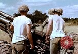 Image of 1st Cavalry Division artillerymen firing 105mm Howitzer Plei Me Vietnam, 1965, second 40 stock footage video 65675067579