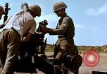 Image of 1st Cavalry Division artillerymen firing 105mm Howitzer Plei Me Vietnam, 1965, second 43 stock footage video 65675067579