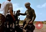 Image of 1st Cavalry Division artillerymen firing 105mm Howitzer Plei Me Vietnam, 1965, second 44 stock footage video 65675067579