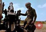 Image of 1st Cavalry Division artillerymen firing 105mm Howitzer Plei Me Vietnam, 1965, second 45 stock footage video 65675067579