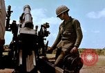 Image of 1st Cavalry Division artillerymen firing 105mm Howitzer Plei Me Vietnam, 1965, second 46 stock footage video 65675067579
