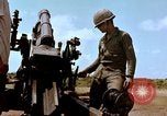 Image of 1st Cavalry Division artillerymen firing 105mm Howitzer Plei Me Vietnam, 1965, second 47 stock footage video 65675067579