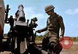 Image of 1st Cavalry Division artillerymen firing 105mm Howitzer Plei Me Vietnam, 1965, second 48 stock footage video 65675067579