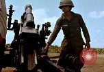 Image of 1st Cavalry Division artillerymen firing 105mm Howitzer Plei Me Vietnam, 1965, second 49 stock footage video 65675067579