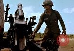 Image of 1st Cavalry Division artillerymen firing 105mm Howitzer Plei Me Vietnam, 1965, second 50 stock footage video 65675067579