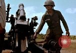 Image of 1st Cavalry Division artillerymen firing 105mm Howitzer Plei Me Vietnam, 1965, second 52 stock footage video 65675067579