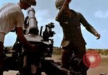 Image of 1st Cavalry Division artillerymen firing 105mm Howitzer Plei Me Vietnam, 1965, second 54 stock footage video 65675067579