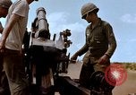Image of 1st Cavalry Division artillerymen firing 105mm Howitzer Plei Me Vietnam, 1965, second 55 stock footage video 65675067579