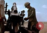 Image of 1st Cavalry Division artillerymen firing 105mm Howitzer Plei Me Vietnam, 1965, second 57 stock footage video 65675067579