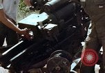 Image of 1st Cavalry Division artillerymen firing 105mm Howitzer Plei Me Vietnam, 1965, second 61 stock footage video 65675067579