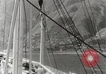 Standbild Touristen verlassen Schiff mit dem Motorboot zu besuchen Vargas Venezuela, 1936, aus Sekunde 10 historischem Filmmaterial Videoclip 65675067694