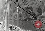 Standbild Touristen verlassen Schiff mit dem Motorboot zu besuchen Vargas Venezuela, 1936, aus Sekunde 12 historischem Filmmaterial Videoclip 65675067694