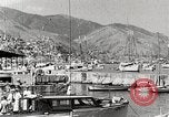 Standbild Touristen verlassen Schiff mit dem Motorboot zu besuchen Vargas Venezuela, 1936, aus Sekunde 23 historischem Filmmaterial Videoclip 65675067694
