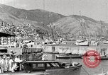 Standbild Touristen verlassen Schiff mit dem Motorboot zu besuchen Vargas Venezuela, 1936, aus Sekunde 24 historischem Filmmaterial Videoclip 65675067694
