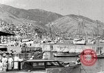 Standbild Touristen verlassen Schiff mit dem Motorboot zu besuchen Vargas Venezuela, 1936, aus Sekunde 28 historischem Filmmaterial Videoclip 65675067694