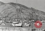 Standbild Touristen verlassen Schiff mit dem Motorboot zu besuchen Vargas Venezuela, 1936, aus Sekunde 29 historischem Filmmaterial Videoclip 65675067694