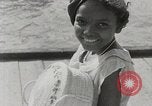 Image personnes shopping Kingston Jamaïque, 1936, de la seconde 40 séquences d'archives historiques vidéo 65675067699