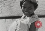 Image personnes shopping Kingston Jamaïque, 1936, de la seconde 41 séquences d'archives historiques vidéo 65675067699