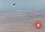 Image of Firebee drone suspended from CH-3 Sea King helicopter California United States USA, 1971, second 3 stock footage video 65675067709