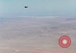 Image of Firebee drone suspended from CH-3 Sea King helicopter California United States USA, 1971, second 7 stock footage video 65675067709