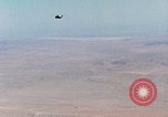 Image of Firebee drone suspended from CH-3 Sea King helicopter California United States USA, 1971, second 11 stock footage video 65675067709