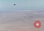 Image of Firebee drone suspended from CH-3 Sea King helicopter California United States USA, 1971, second 12 stock footage video 65675067709