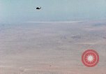 Image of Firebee drone suspended from CH-3 Sea King helicopter California United States USA, 1971, second 14 stock footage video 65675067709