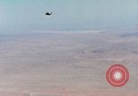 Image of Firebee drone suspended from CH-3 Sea King helicopter California United States USA, 1971, second 15 stock footage video 65675067709