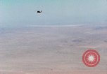 Image of Firebee drone suspended from CH-3 Sea King helicopter California United States USA, 1971, second 17 stock footage video 65675067709