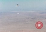 Image of Firebee drone suspended from CH-3 Sea King helicopter California United States USA, 1971, second 25 stock footage video 65675067709