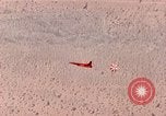 Image of Firebee drone suspended from CH-3 Sea King helicopter California United States USA, 1971, second 29 stock footage video 65675067709