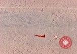 Image of Firebee drone suspended from CH-3 Sea King helicopter California United States USA, 1971, second 30 stock footage video 65675067709