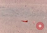 Image of Firebee drone suspended from CH-3 Sea King helicopter California United States USA, 1971, second 31 stock footage video 65675067709