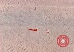 Image of Firebee drone suspended from CH-3 Sea King helicopter California United States USA, 1971, second 35 stock footage video 65675067709
