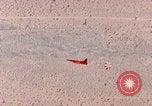 Image of Firebee drone suspended from CH-3 Sea King helicopter California United States USA, 1971, second 38 stock footage video 65675067709